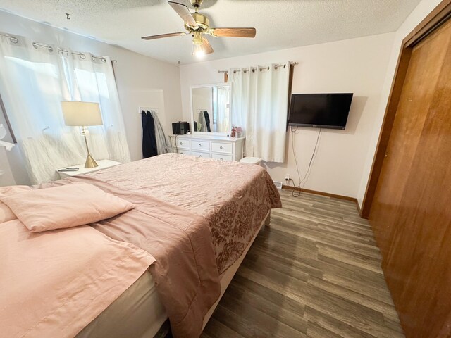 1908 Summit Ave, Worthington, MN 56187 - bedroom featuring wood finished floors, a textured ceiling, a closet, and a ceiling fan