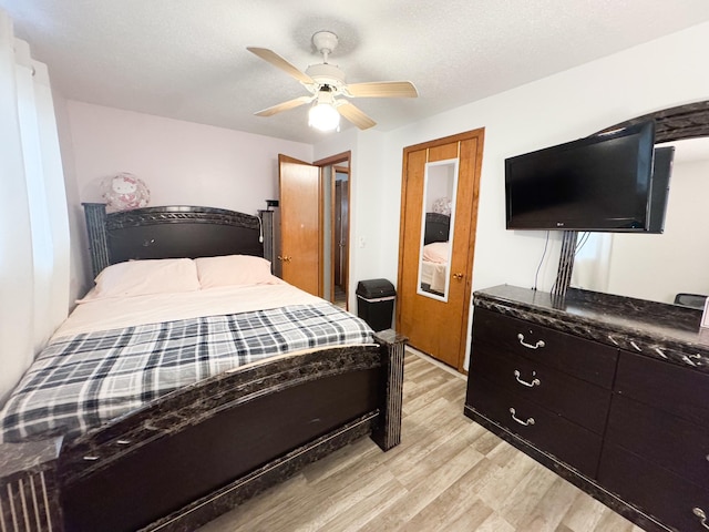 1908 Summit Ave, Worthington, MN 56187 - bedroom with light wood-style floors and a ceiling fan