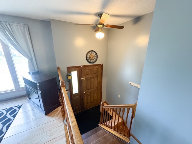1908 Summit Ave, Worthington, MN 56187 - foyer with wood finished floors and ceiling fan