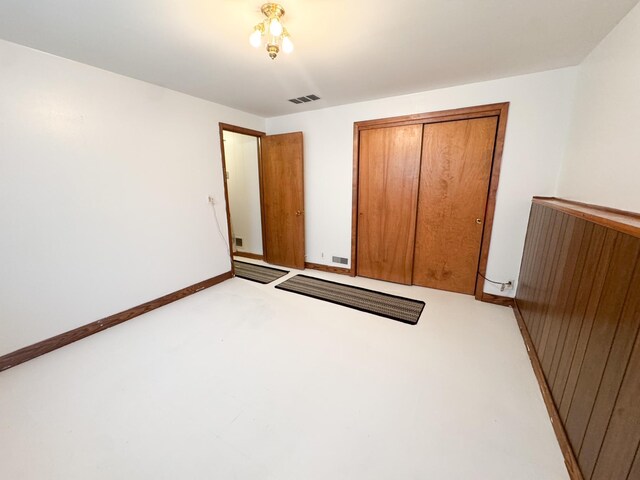 1908 Summit Ave, Worthington, MN 56187 - unfurnished bedroom with a closet and baseboards