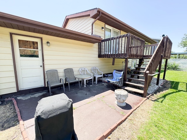 1908 Summit Ave, Worthington, MN 56187 - view of patio featuring stairway and a wooden deck