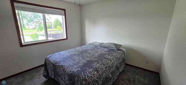 961 39 1/2 Ave W, West Fargo, ND 58078 - carpeted bedroom with baseboards