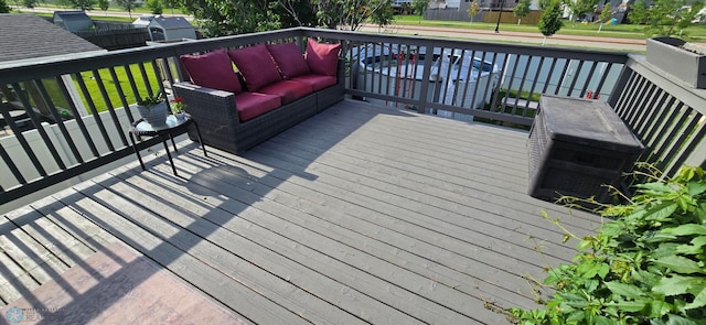961 39 1/2 Ave W, West Fargo, ND 58078 - wooden terrace featuring an outdoor hangout area