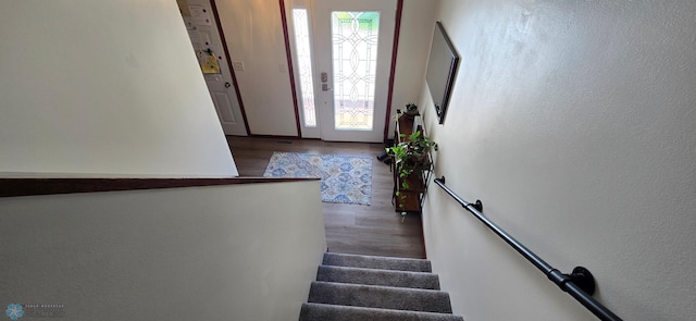961 39 1/2 Ave W, West Fargo, ND 58078 - stairway with wood finished floors and a textured wall