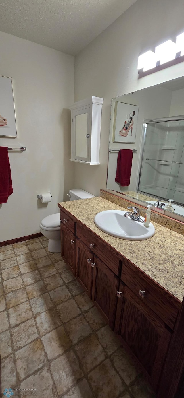 961 39 1/2 Ave W, West Fargo, ND 58078 - full bath featuring vanity, a shower with door, and stone finish floors