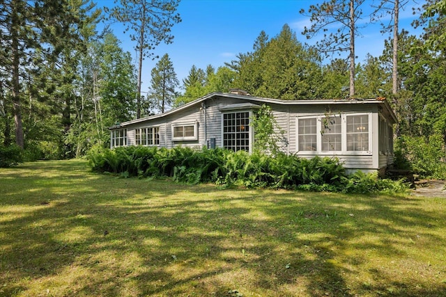 31905 Jefferson Blvd, Greenway Twp, MN 55775 - view of property exterior with a yard