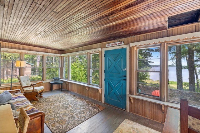 31905 Jefferson Blvd, Greenway Twp, MN 55775 - sunroom / solarium with a water view, wood ceiling, hardwood / wood-style floors, and wooden walls