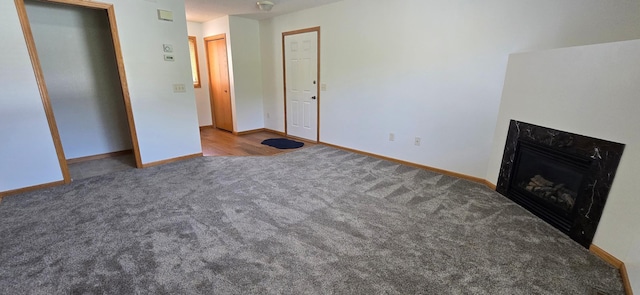 5293 Manchester Dr Unit 1, Maple Plain, MN 55359 - unfurnished living room with carpet flooring and a high end fireplace
