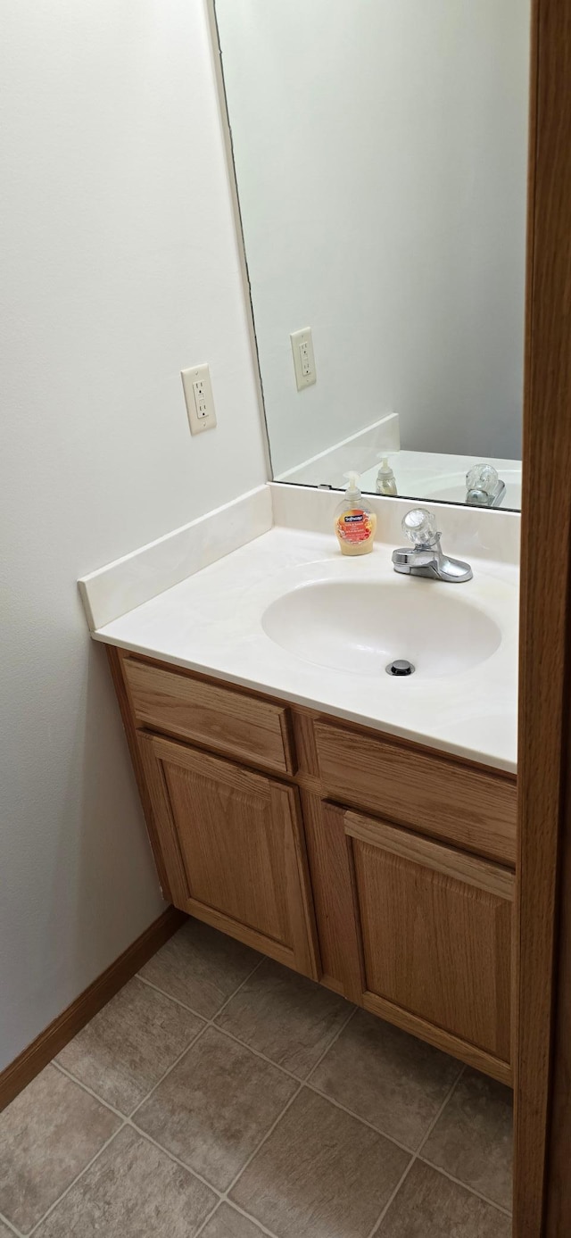5293 Manchester Dr Unit 1, Maple Plain, MN 55359 - bathroom with vanity and tile patterned flooring