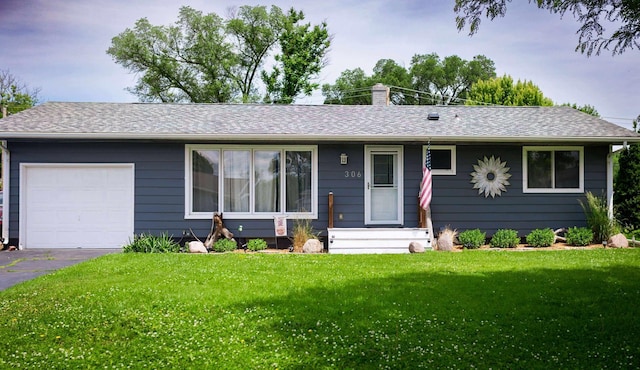 306 4th St, La Crescent, MN 55947 - ranch-style house with an attached garage, a front yard, a chimney, roof with shingles, and driveway