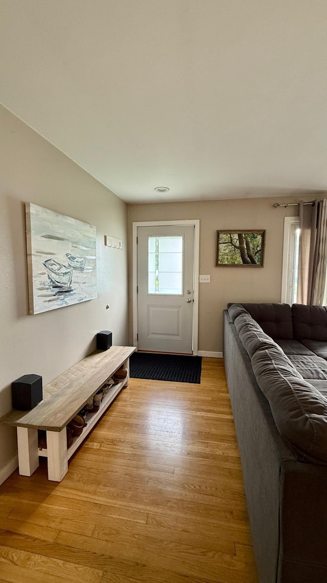 306 4th St, La Crescent, MN 55947 - foyer featuring light wood-style floors and baseboards