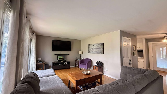 306 4th St, La Crescent, MN 55947 - living room with wood finished floors and ceiling fan