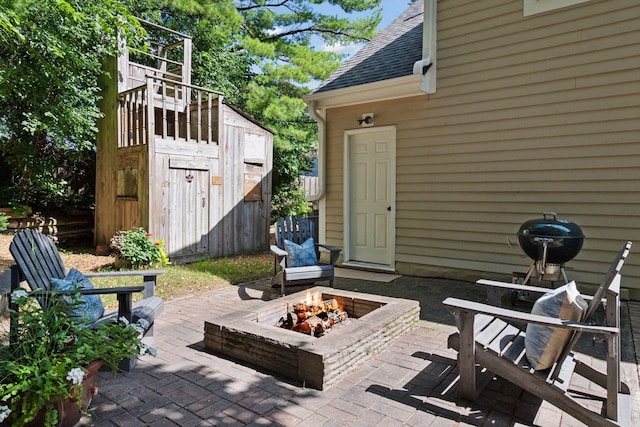 10301 Brunswick Cir, Bloomington, MN 55438 - view of patio / terrace with a fire pit