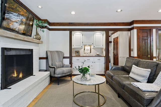 10301 Brunswick Cir, Bloomington, MN 55438 - living area with light wood-style floors, a fireplace, and recessed lighting