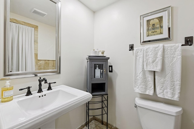 10301 Brunswick Cir, Bloomington, MN 55438 - bathroom featuring a sink and toilet