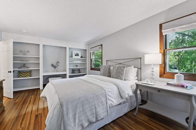 10301 Brunswick Cir, Bloomington, MN 55438 - bedroom with hardwood / wood-style flooring and an office area