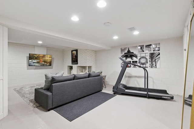 10301 Brunswick Cir, Bloomington, MN 55438 - workout area with recessed lighting and concrete block wall