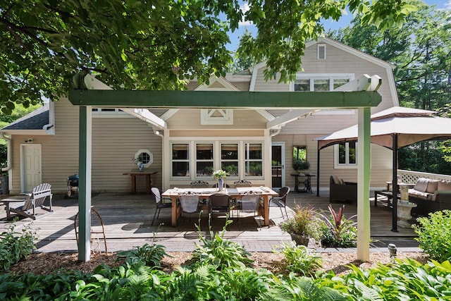10301 Brunswick Cir, Bloomington, MN 55438 - rear view of property with a wooden deck, an outdoor hangout area, and outdoor dining space