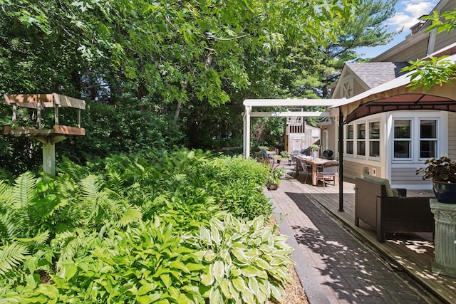 10301 Brunswick Cir, Bloomington, MN 55438 - view of yard featuring a wooden deck