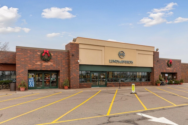 10301 Brunswick Cir, Bloomington, MN 55438 - view of commercial property featuring uncovered parking