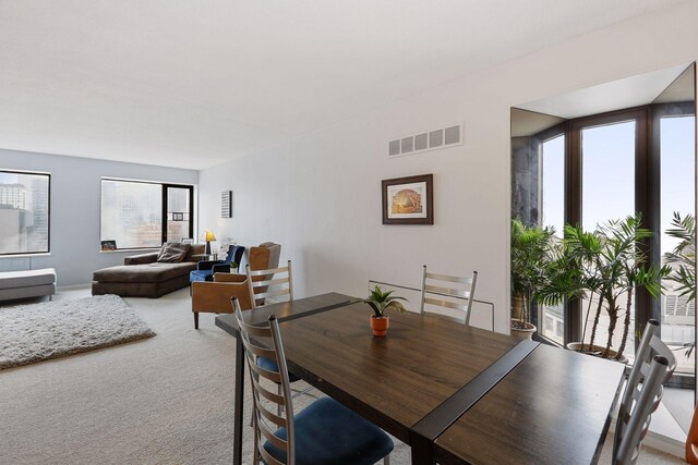 19 1st St Unit B2207, Minneapolis, MN 55401 - dining space featuring carpet flooring