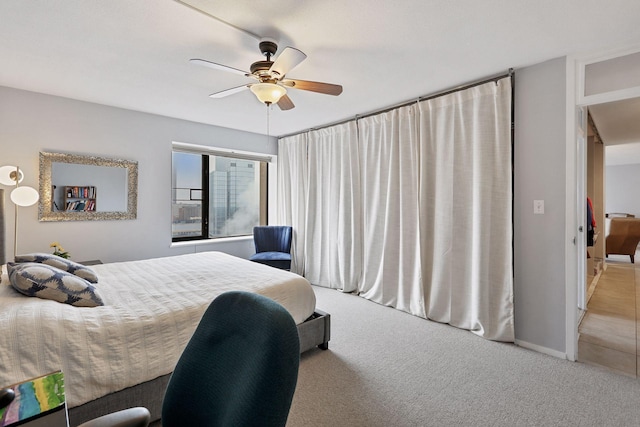 19 1st St Unit B2207, Minneapolis, MN 55401 - carpeted bedroom featuring a ceiling fan and baseboards