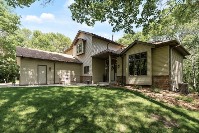13756 Skyline Cir, Louisville Twp, MN 55379 - view of front of home featuring a front lawn and brick siding