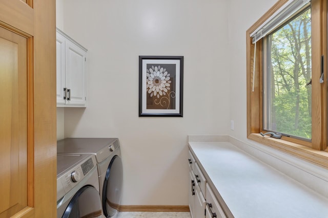 13756 Skyline Cir, Louisville Twp, MN 55379 - washroom featuring cabinet space and separate washer and dryer