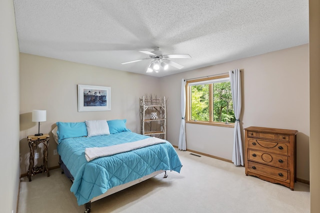 13756 Skyline Cir, Louisville Twp, MN 55379 - carpeted bedroom featuring ceiling fan and a textured ceiling