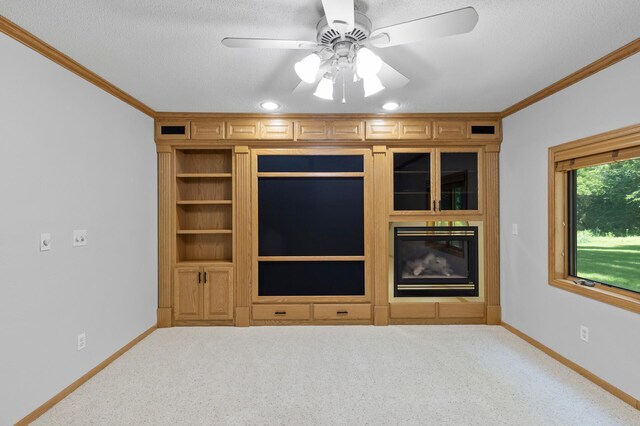 13756 Skyline Cir, Louisville Twp, MN 55379 - unfurnished living room featuring crown molding, carpet floors, a textured ceiling, a ceiling fan, and a fireplace