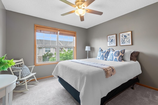 9769 Pinehurst Ct, Elko New Market, MN 55020 - carpeted bedroom with a ceiling fan and a textured ceiling