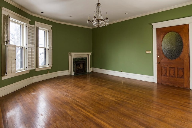 11 Summit Ct Unit 11, Saint Paul, MN 55102 - unfurnished living room featuring a chandelier, wood finished floors, a high end fireplace, and ornamental molding