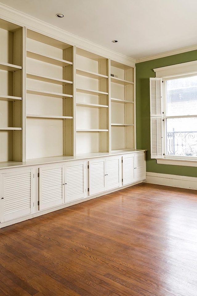 11 Summit Ct Unit 11, Saint Paul, MN 55102 - empty room with crown molding and wood finished floors