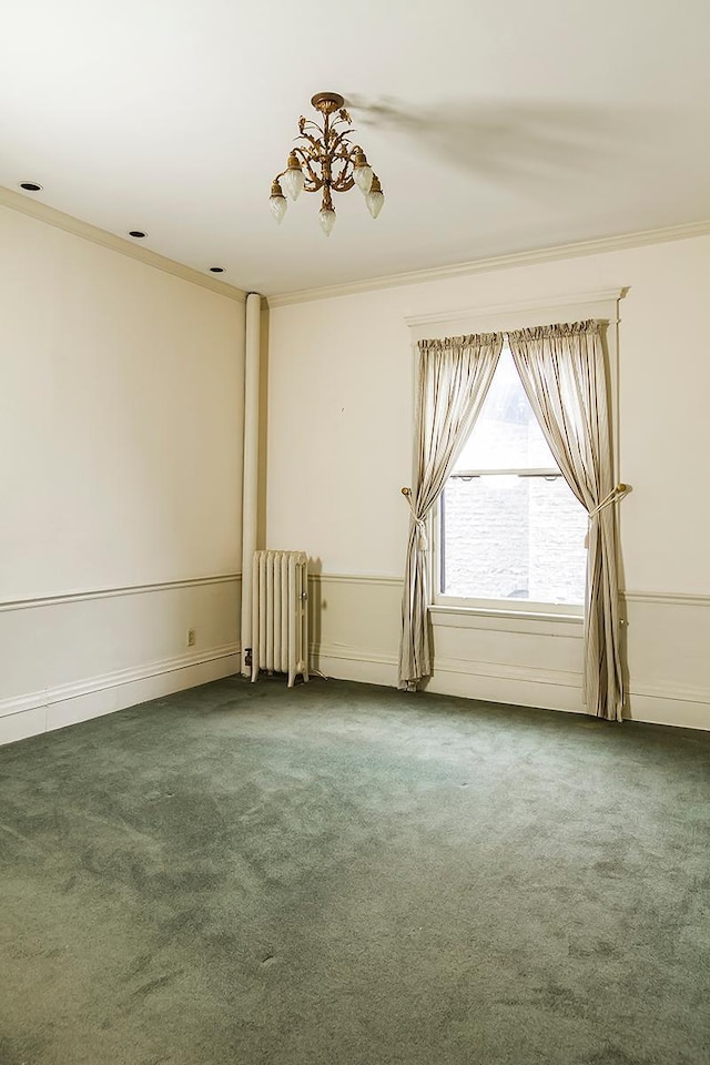 11 Summit Ct Unit 11, Saint Paul, MN 55102 - unfurnished room featuring radiator heating unit, carpet floors, ornamental molding, and a chandelier