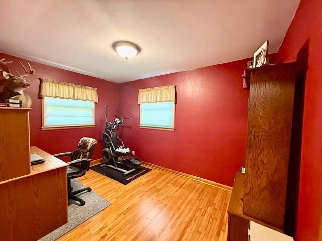 819 Washington St E, Caledonia, MN 55921 - home office featuring wood finished floors