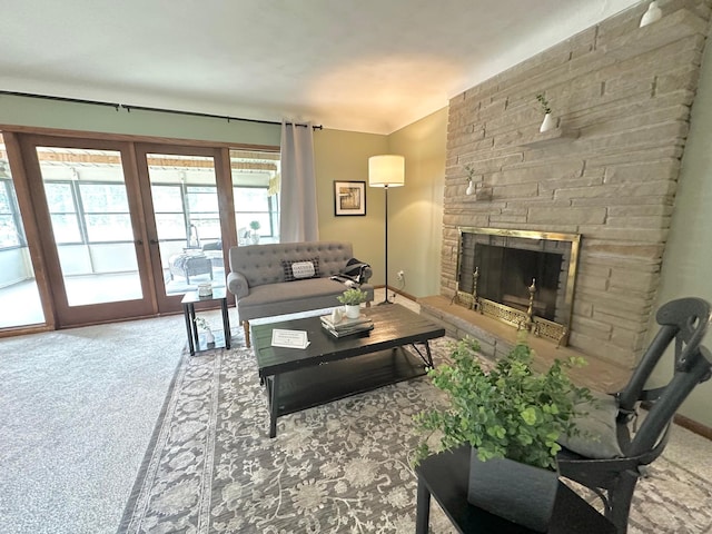 434 Rose Ave E, Saint Paul, MN 55130 - living room with french doors, carpet, and a fireplace