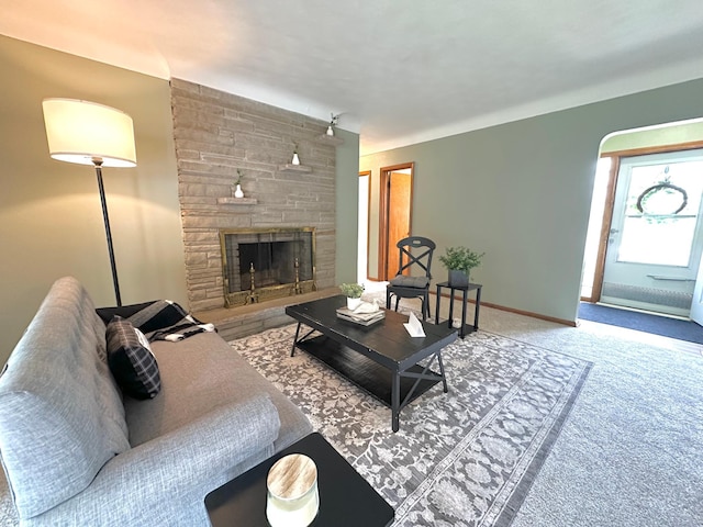 434 Rose Ave E, Saint Paul, MN 55130 - living room featuring a fireplace and carpet floors