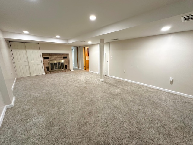 434 Rose Ave E, Saint Paul, MN 55130 - finished basement with carpet flooring, recessed lighting, and a brick fireplace
