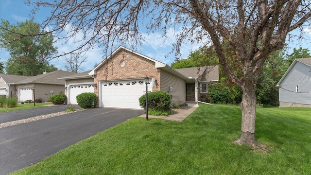 539 Deer Ridge Ln S, Maplewood, MN 55119 - ranch-style house featuring brick siding, a garage, asphalt driveway, and a front yard