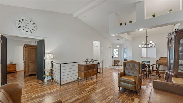 539 Deer Ridge Ln S, Maplewood, MN 55119 - living area with hardwood / wood-style flooring, high vaulted ceiling, beamed ceiling, and a chandelier