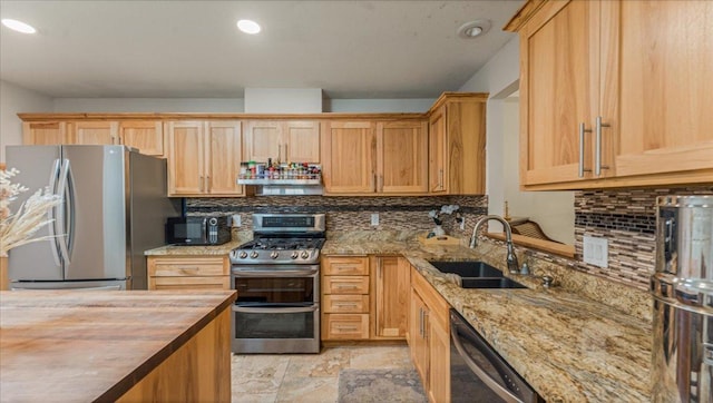 539 Deer Ridge Ln S, Maplewood, MN 55119 - kitchen featuring appliances with stainless steel finishes, tasteful backsplash, wooden counters, and recessed lighting