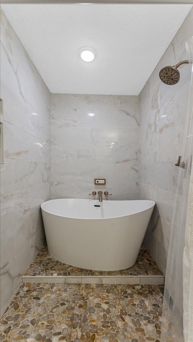 539 Deer Ridge Ln S, Maplewood, MN 55119 - full bath featuring tile walls and a freestanding tub