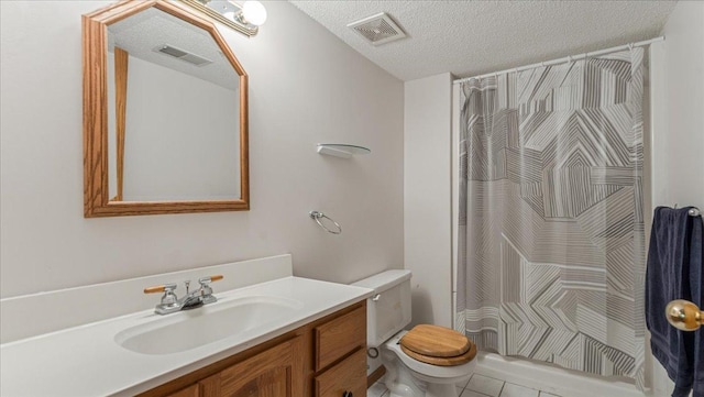 539 Deer Ridge Ln S, Maplewood, MN 55119 - bathroom featuring vanity, a textured ceiling, curtained shower, and tile patterned flooring