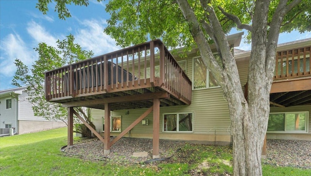 539 Deer Ridge Ln S, Maplewood, MN 55119 - rear view of property featuring a wooden deck and a yard