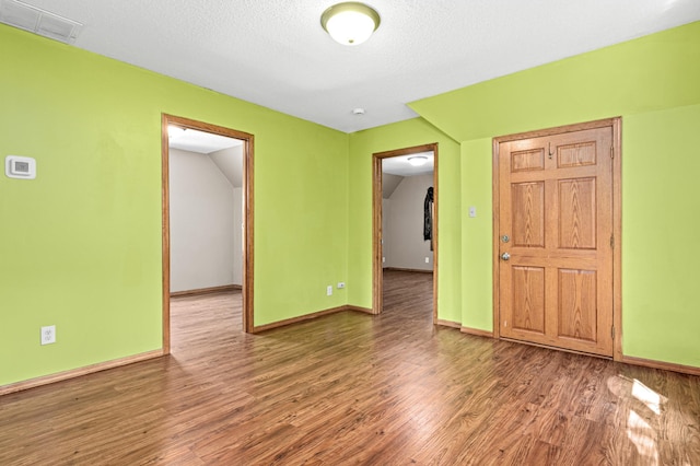 2414 3rd St NE, Minneapolis, MN 55418 - unfurnished room with wood finished floors and baseboards