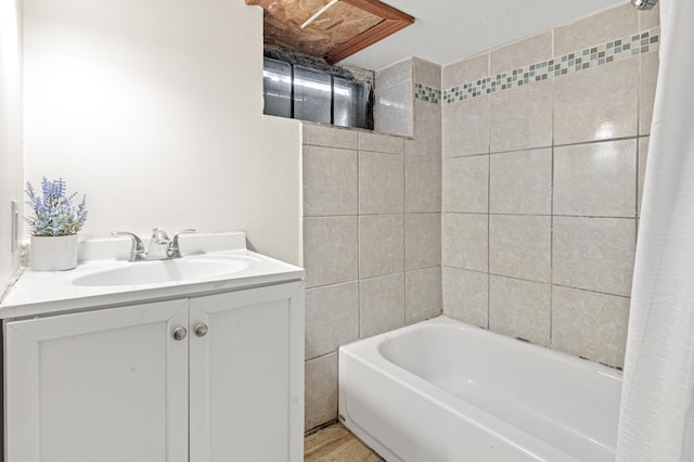 2414 3rd St NE, Minneapolis, MN 55418 - bathroom featuring vanity and shower / bath combo