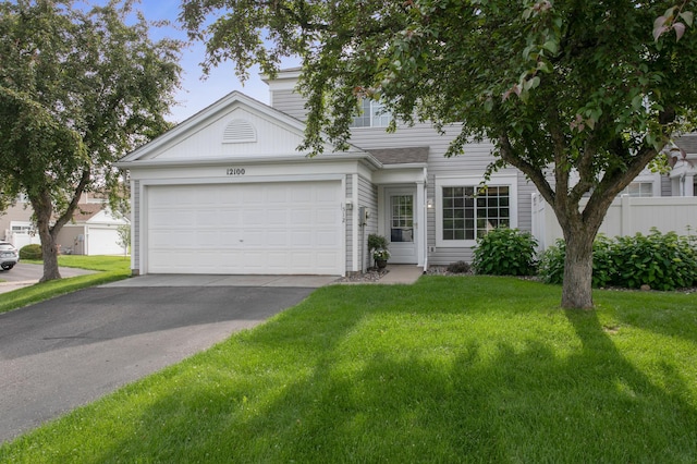 12100 Killdeer St NW Unit 512Nw, Coon Rapids, MN 55448 - view of front of property featuring driveway and an attached garage