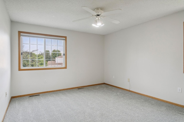 12100 Killdeer St NW Unit 512Nw, Coon Rapids, MN 55448 - empty room with carpet, ceiling fan, and a textured ceiling