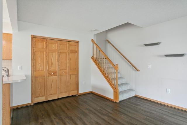 12100 Killdeer St NW Unit 512Nw, Coon Rapids, MN 55448 - staircase featuring wood finished floors and baseboards