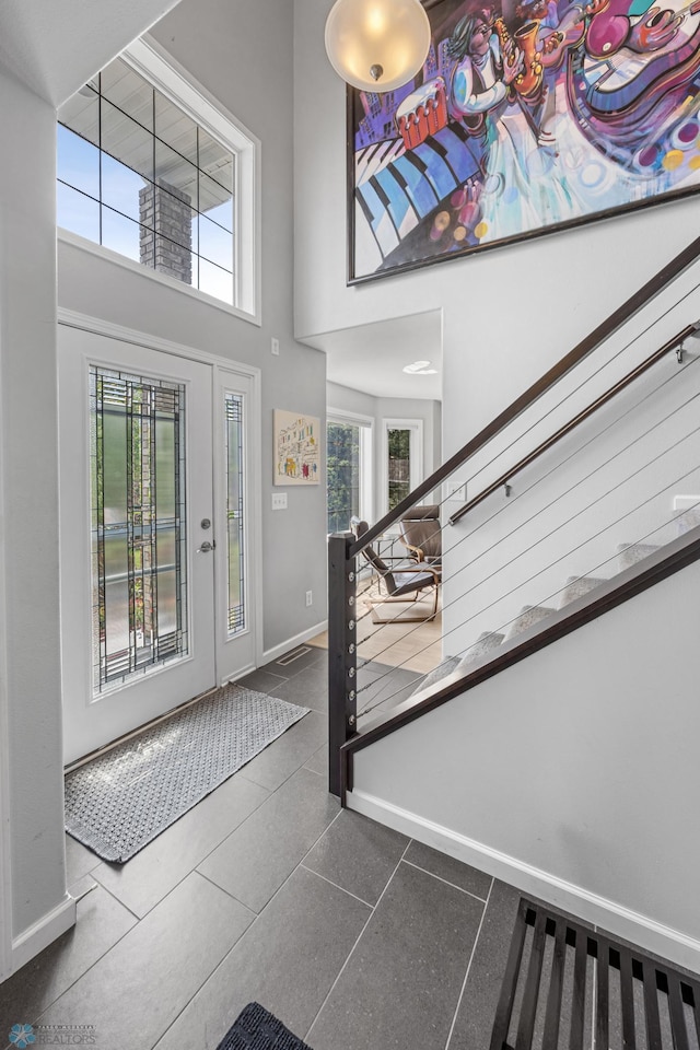 122 15th Ave E, Fargo, ND 58078 - foyer entrance with a towering ceiling and stairway